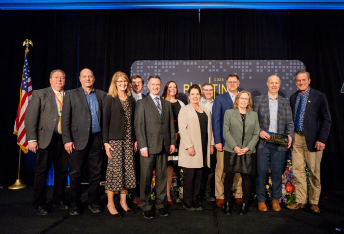 Mitchell Development Corporation winners with Commissioner Fiala, Deputy Commissioner Jesse Fonkert, and Governor Larry Rhoden