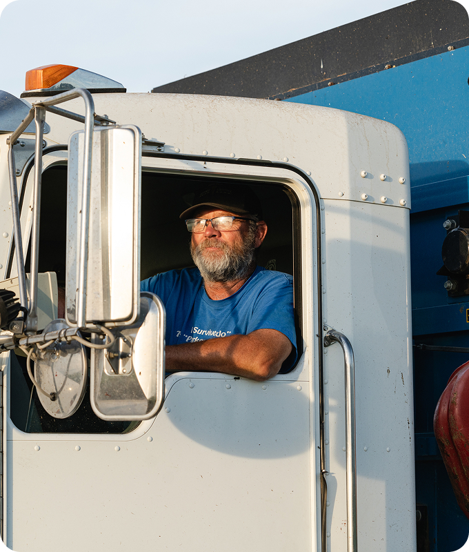 Man driving truck.
