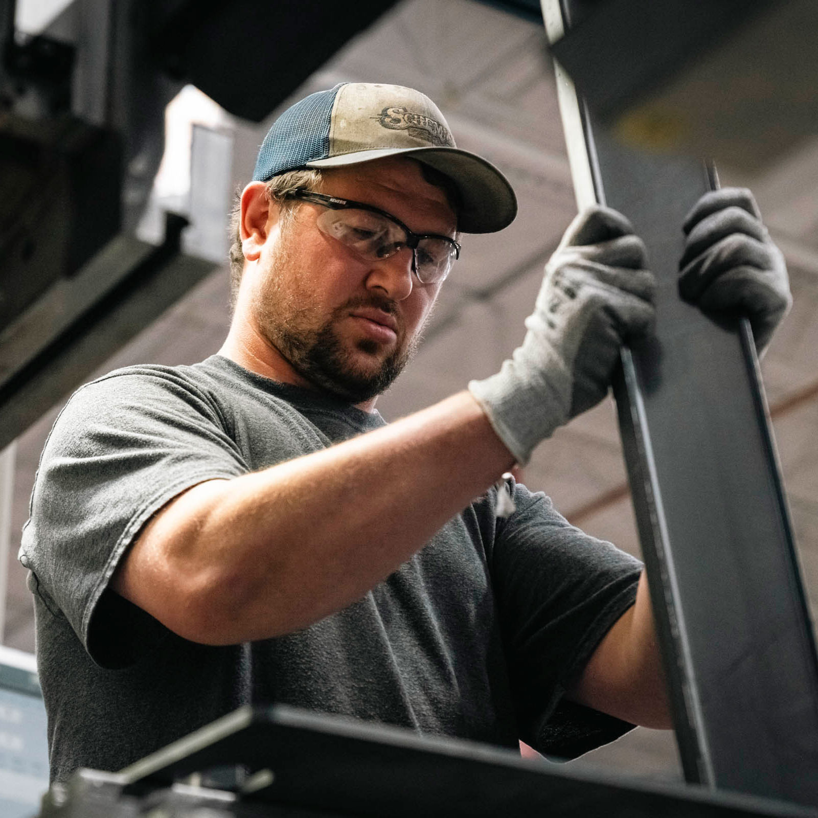 Man working in manufacturing facility.