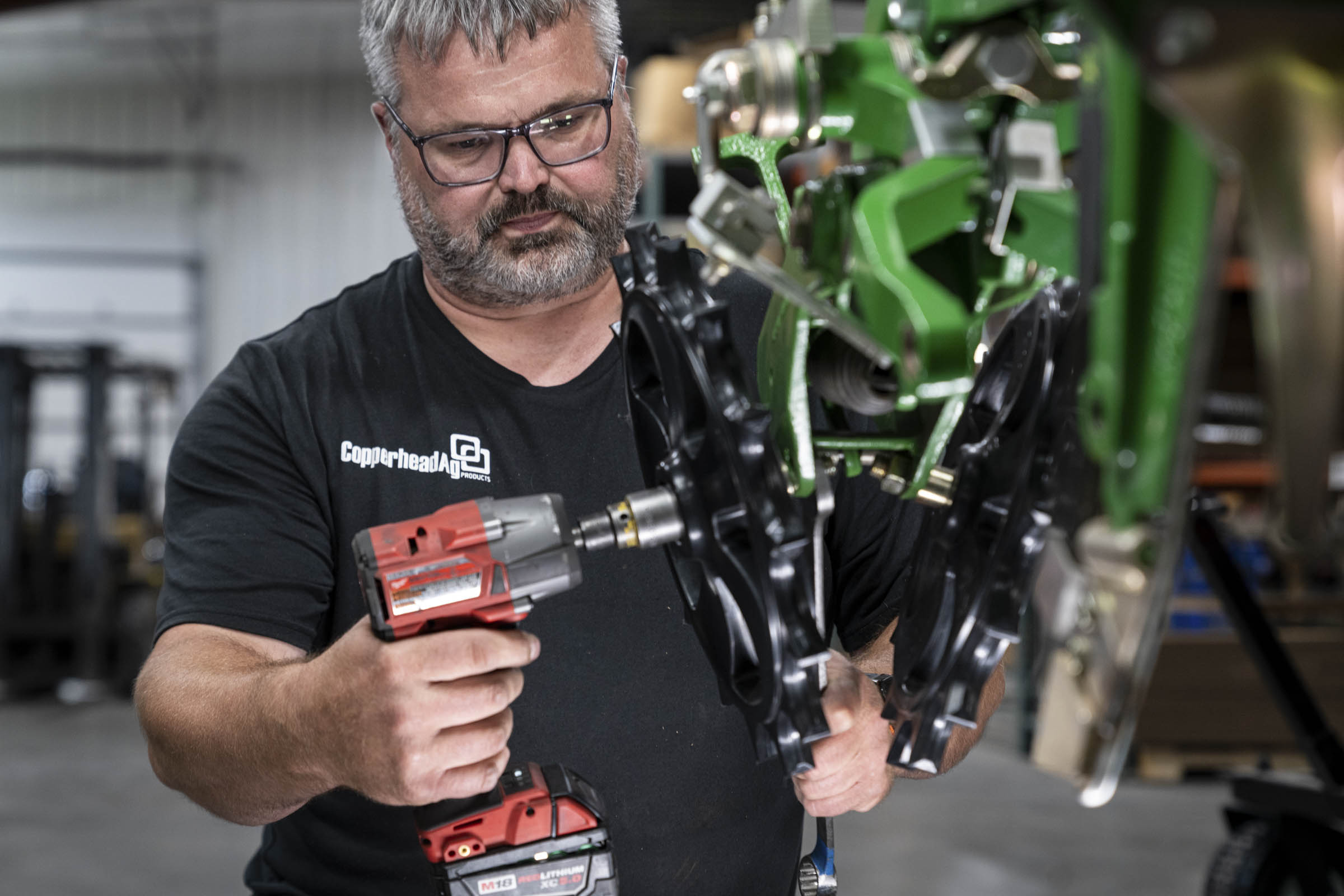 Man working in manufacturing facility.
