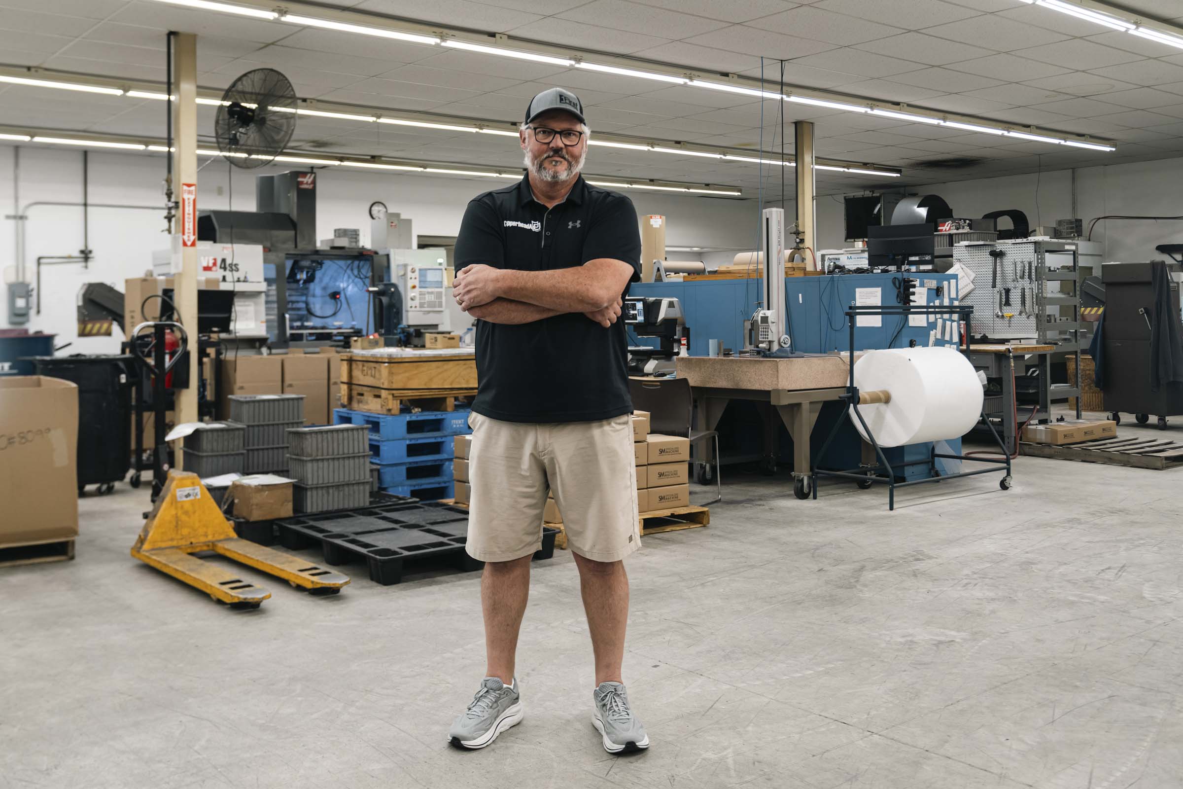 Man working in manufacturing facility.