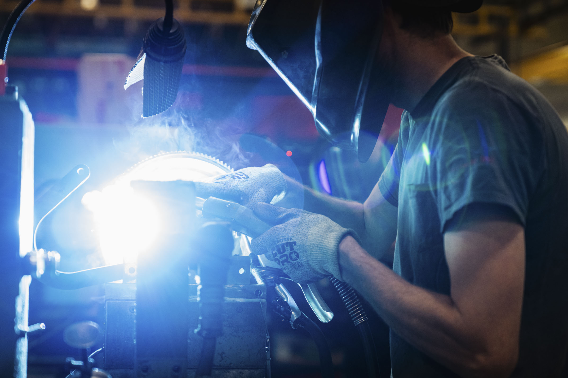 Man working in manufacturing facility.