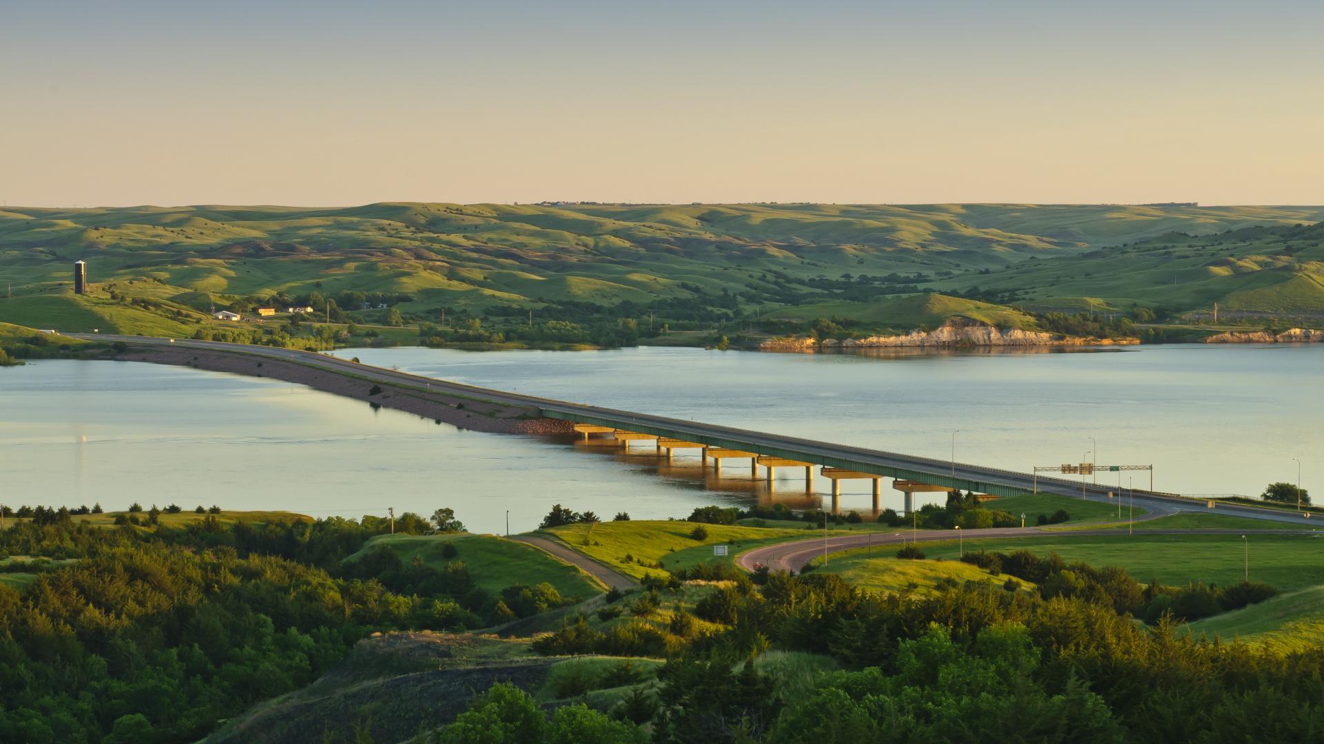 Long highway bridge over water.