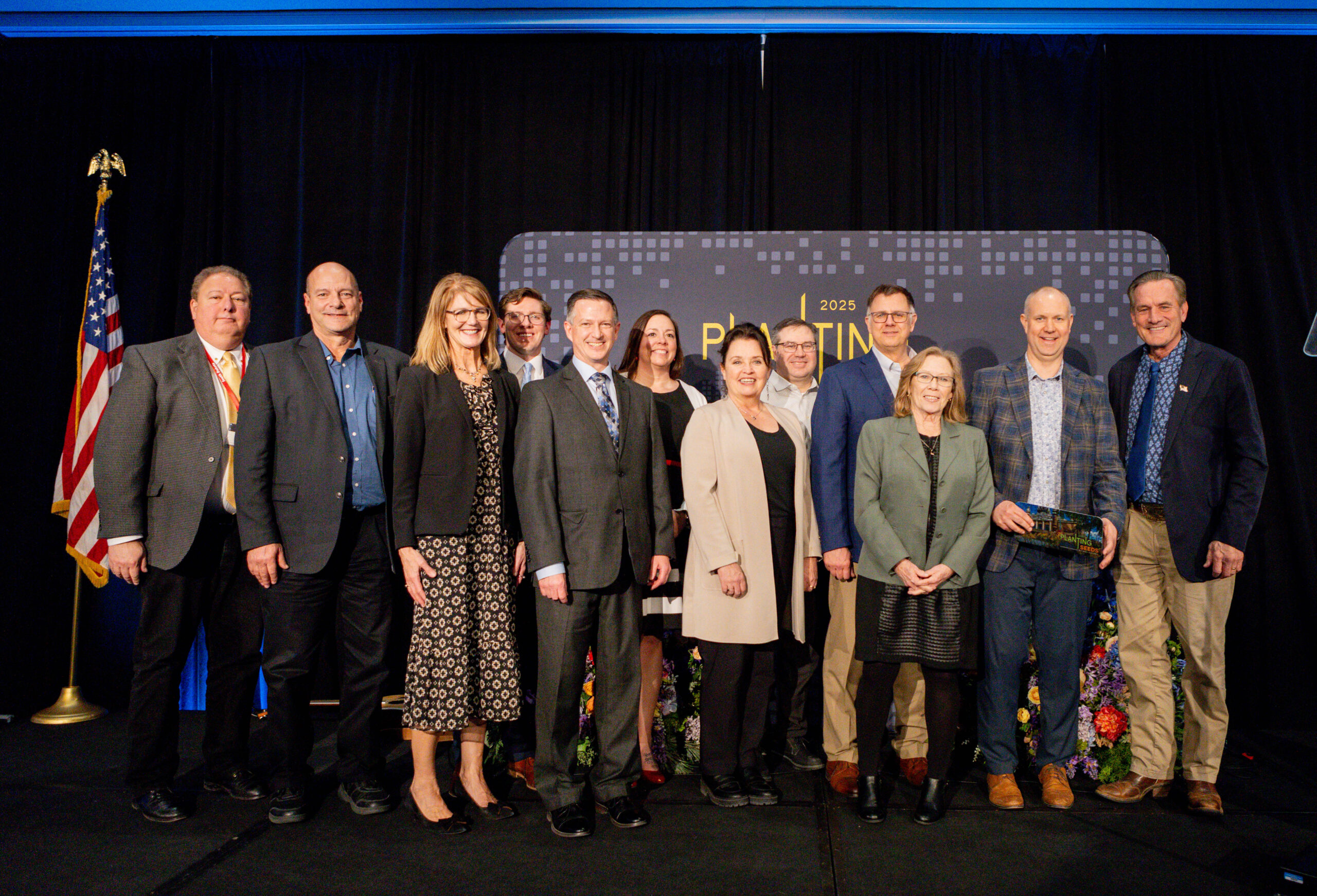 Mitchell Development Corporation winners with Commissioner Fiala, Deputy Commissioner Jesse Fonkert, and Governor Larry Rhoden