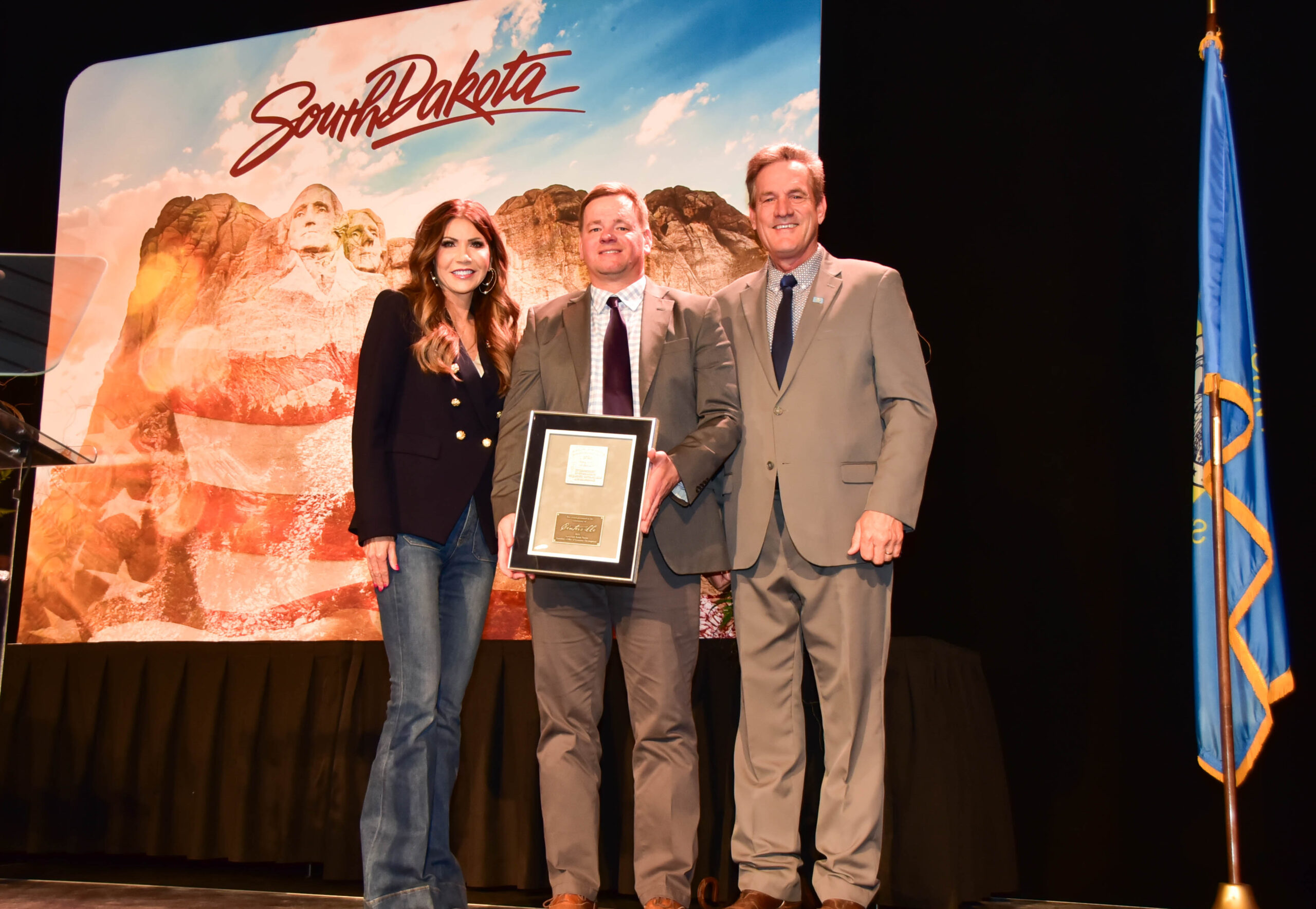 Jared Hybertson accepting the Community of the Year award on behalf of Centerville
